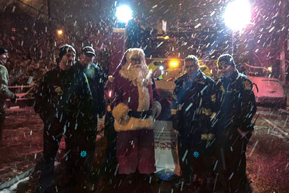 Santa and Firefighters in the Snow